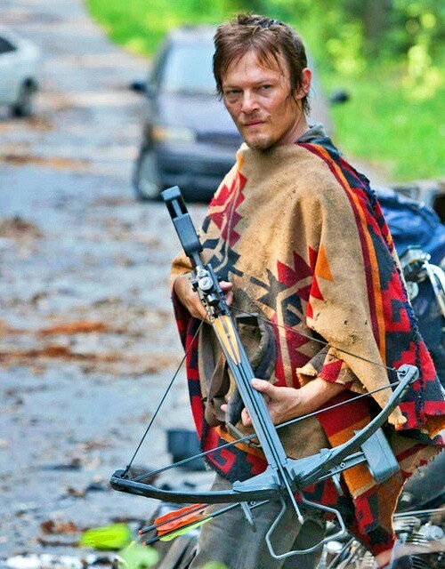 Maggie's wearing Daryl's poncho