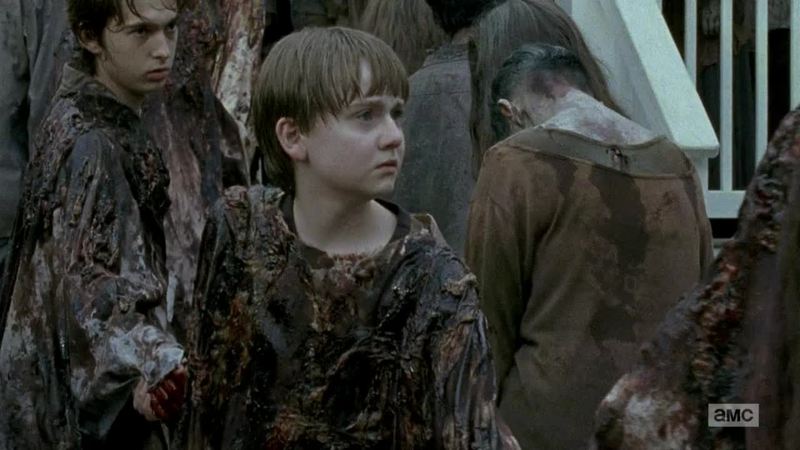 This kid really needs to look at the flowers.
